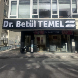 Dr.